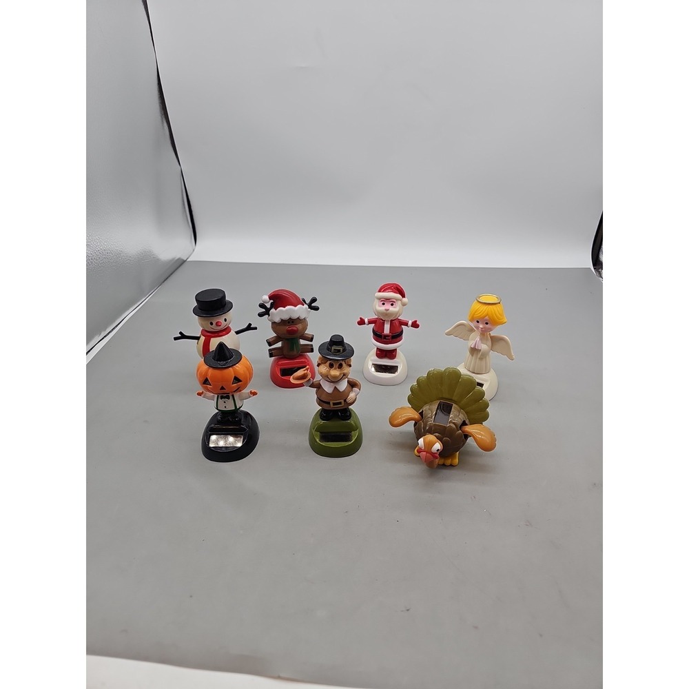Lot of 7 Holiday Solar Sun Dancers Thanksgiving Pilgrims Turkey Pumpkin Santa